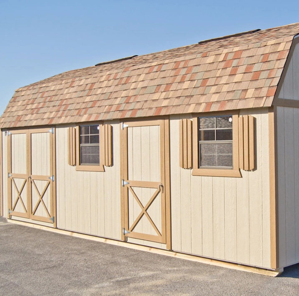 Tan lofted barn with custom door and window layout
