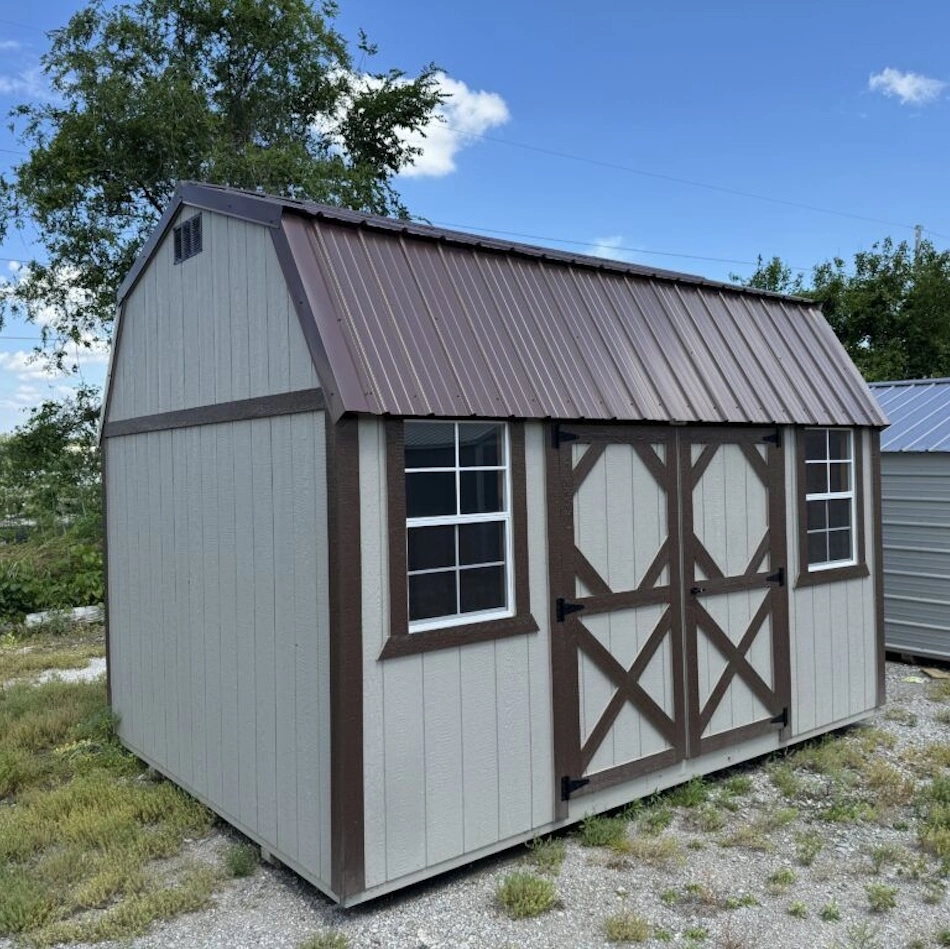 Lofted barn storage shed with double doors on the display lot